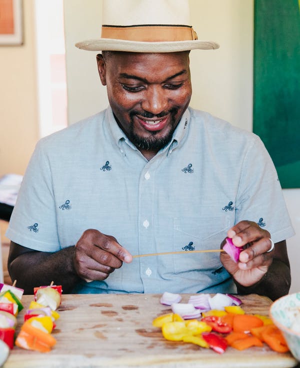 Bryant Terry making tofu kebabs