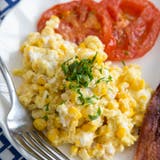 Orak-arik eggs with corn and tomatoes